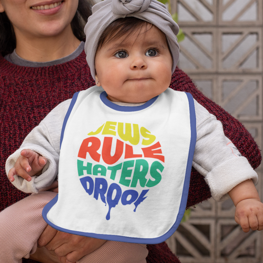 An infant wearing a bib that reads, "Jews Rule, Haters Drool."